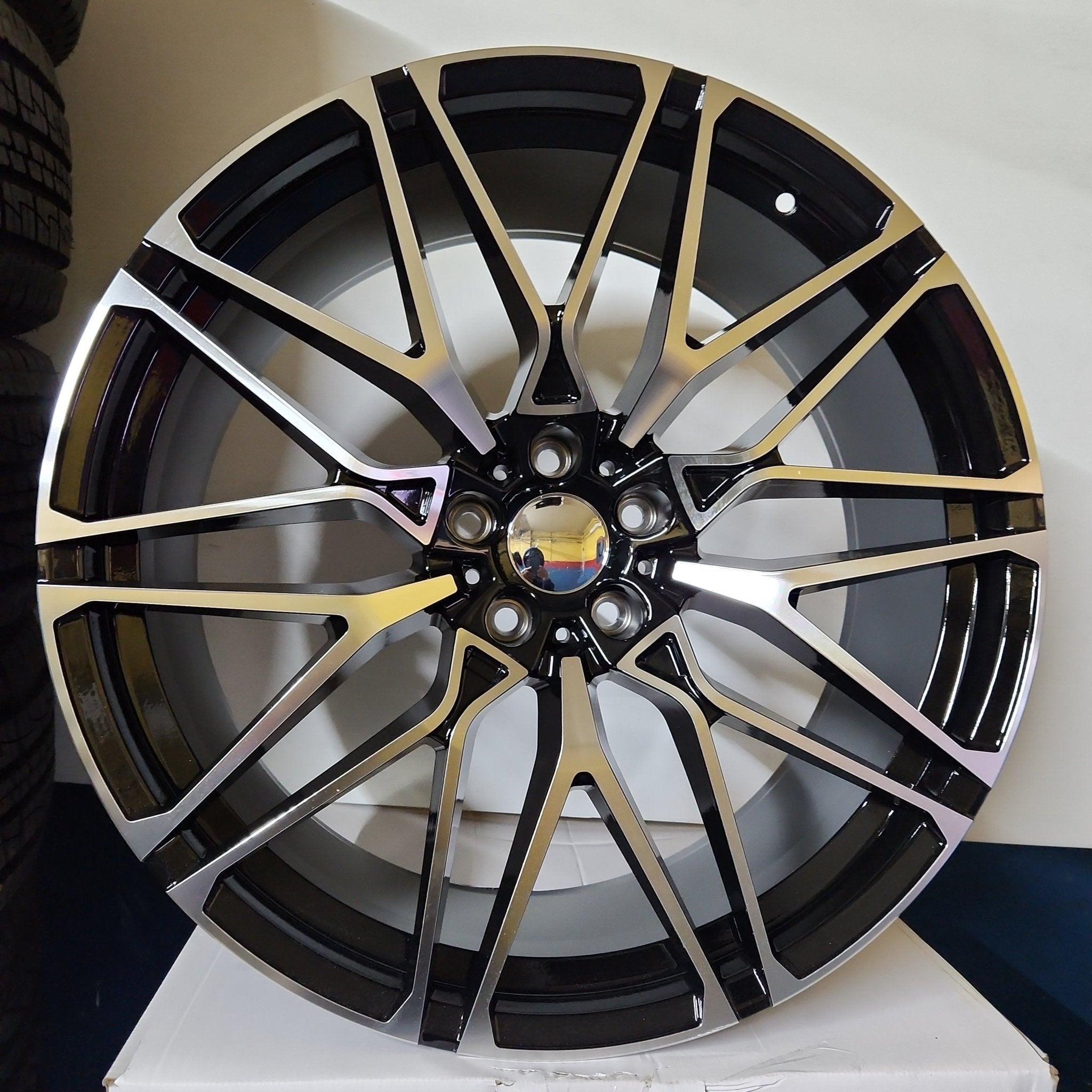 W741 WHEELS 495 22X9.5 5X120 BLACK MACHINE FACE