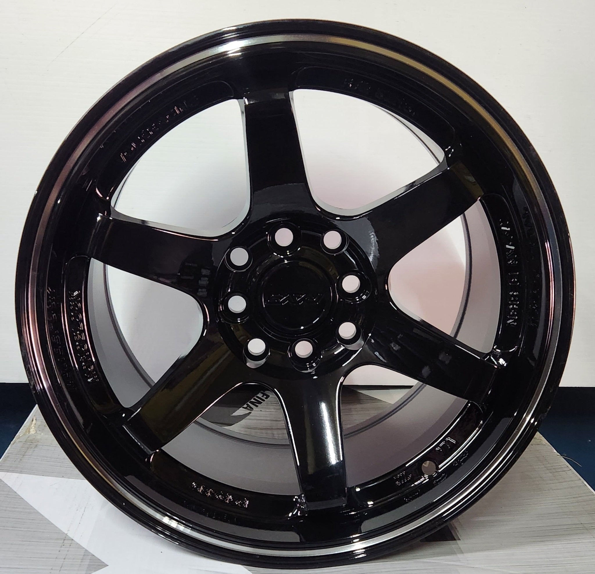 W500 15X7.0 4X100 GLOSS BLACK