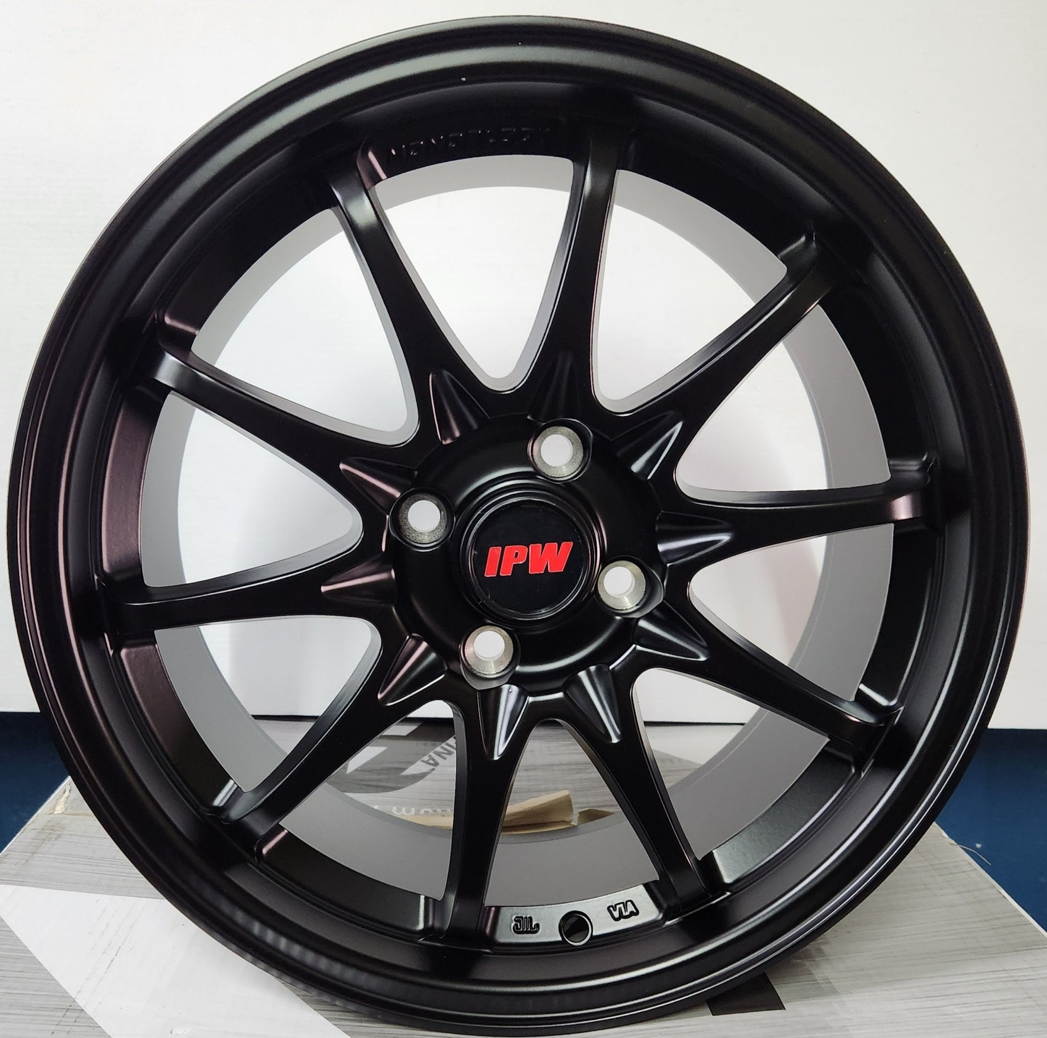 W506 XH1411 16X7.0 4X100 SATIN BLACK