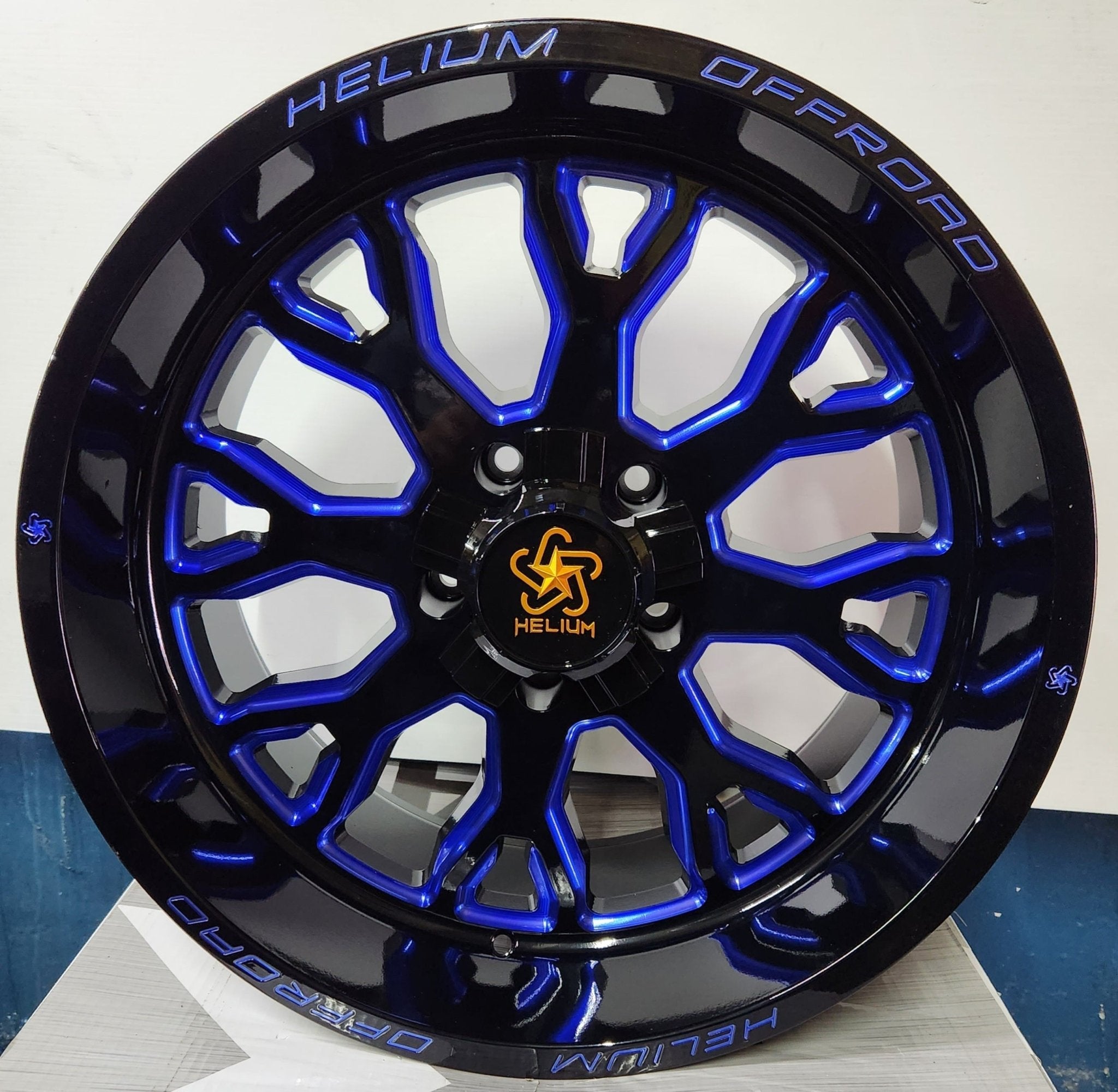 HELIUM HC-1-BM 20X10 5X127 5X139.7 GLOSS BLACK WITH BLUE MILLING
