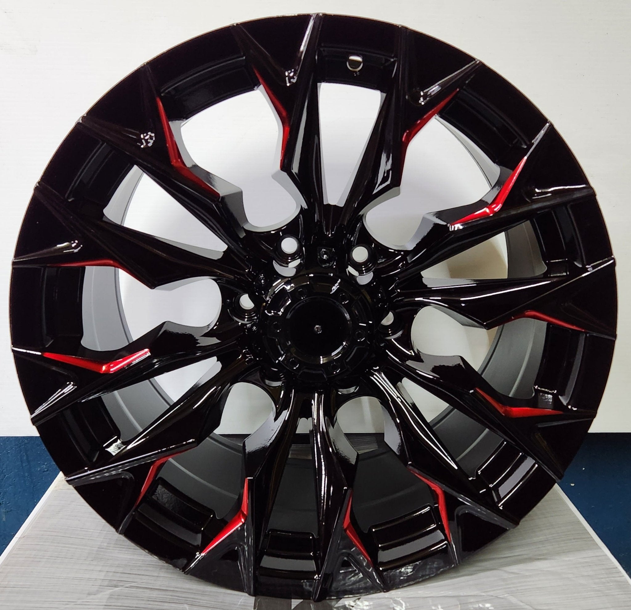 SHOGUN- JT227 18X9.0 6X139.7 PIANO BLACK WITH RED MILLED