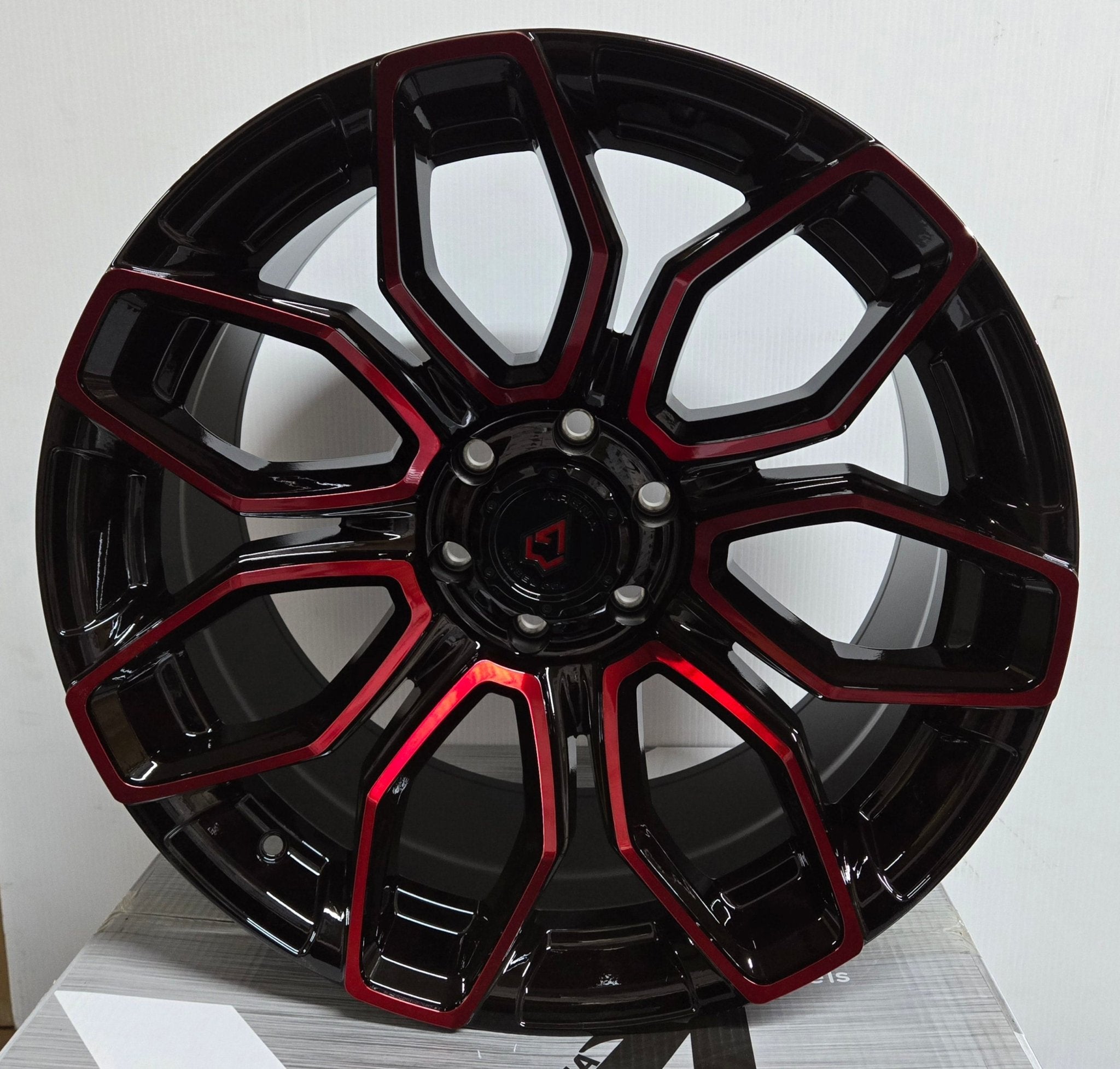 A116 ARENA COBRA 6X135 GLOSS BLACK MACHINE RED TINT
