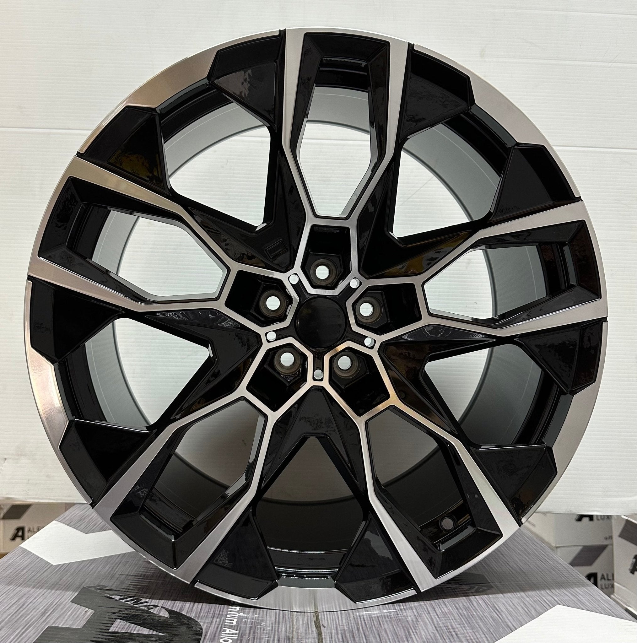 OE-5592 XM 21x9.5 5x112 GLOSS BLACK MACHINED FACE