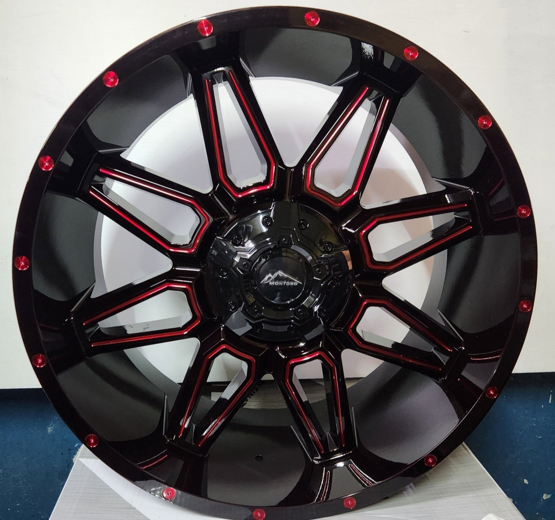 MONTORO M12 20x10 BLANK MG M/RED TINT/ RED RIVETS