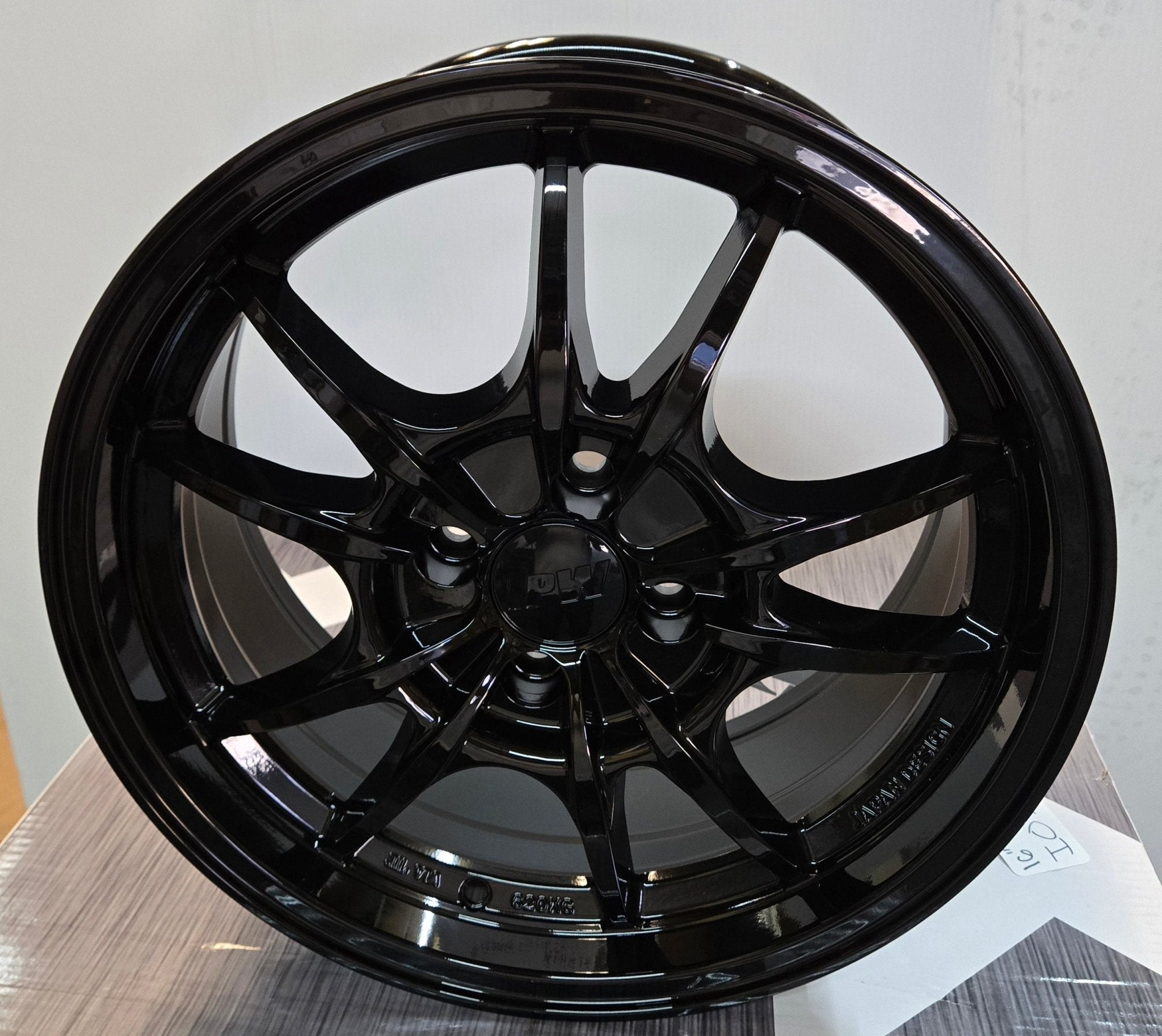 W016 16x7.0 4x100 GLOSS BLACK
