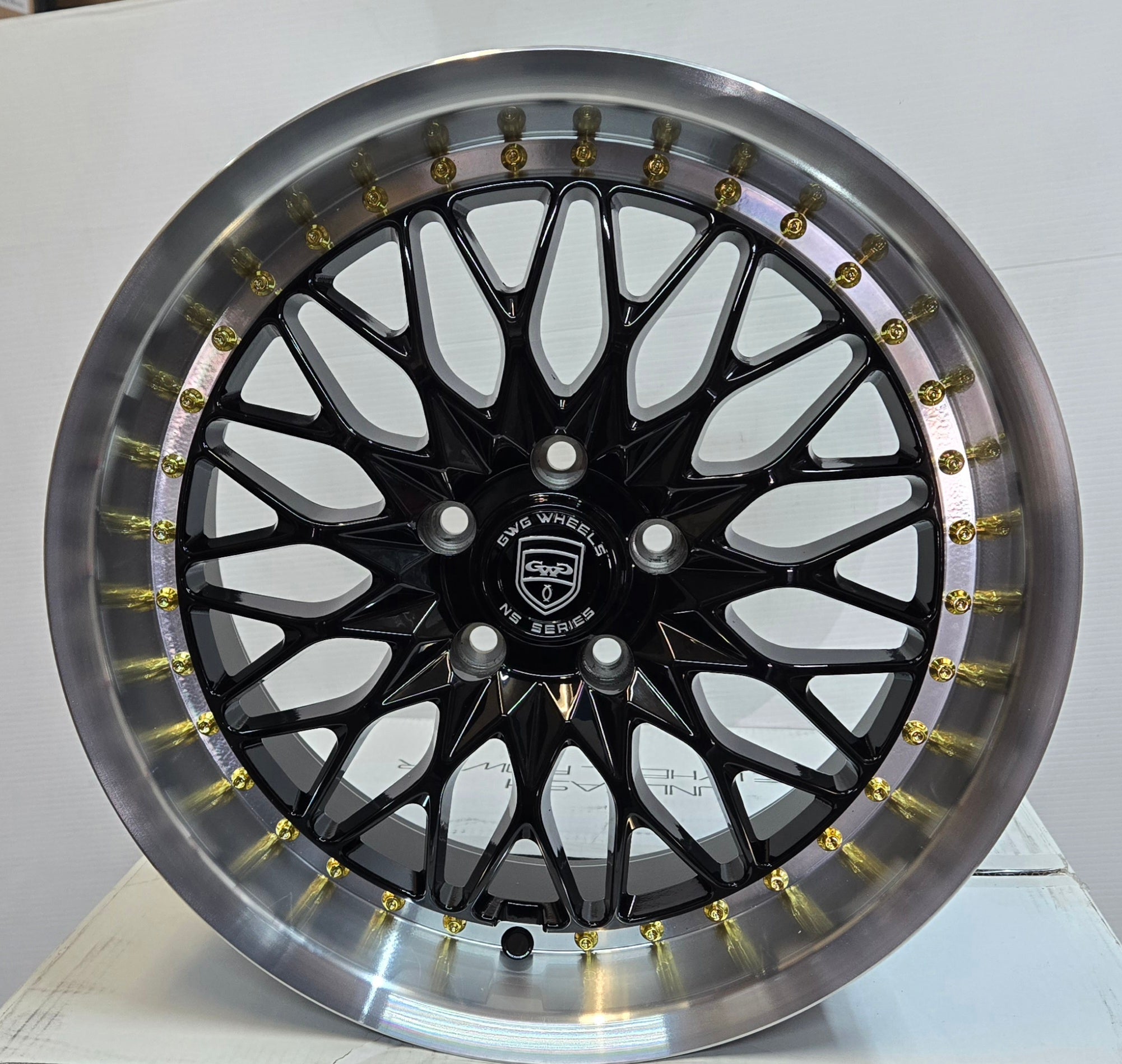 GWG NS5 18X8.5 5X114.3 GLOSS BLACK MACHINED LIP GOLD RIVETS