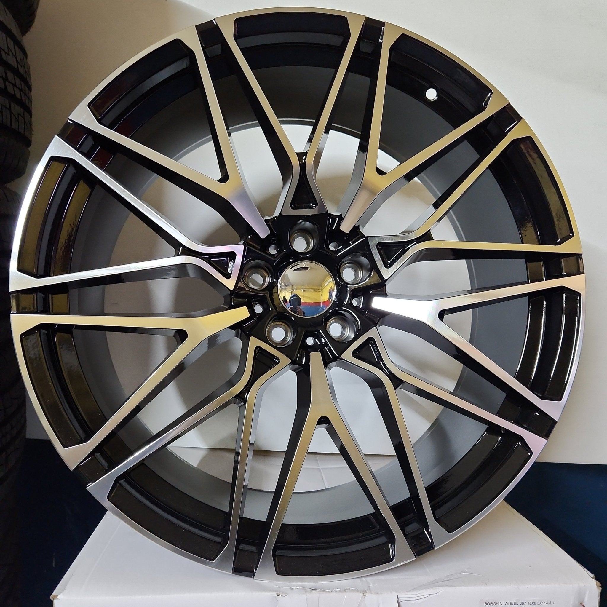 W741 WHEELS 495 22X10.5 5X120 BLACK MACHINE FACE