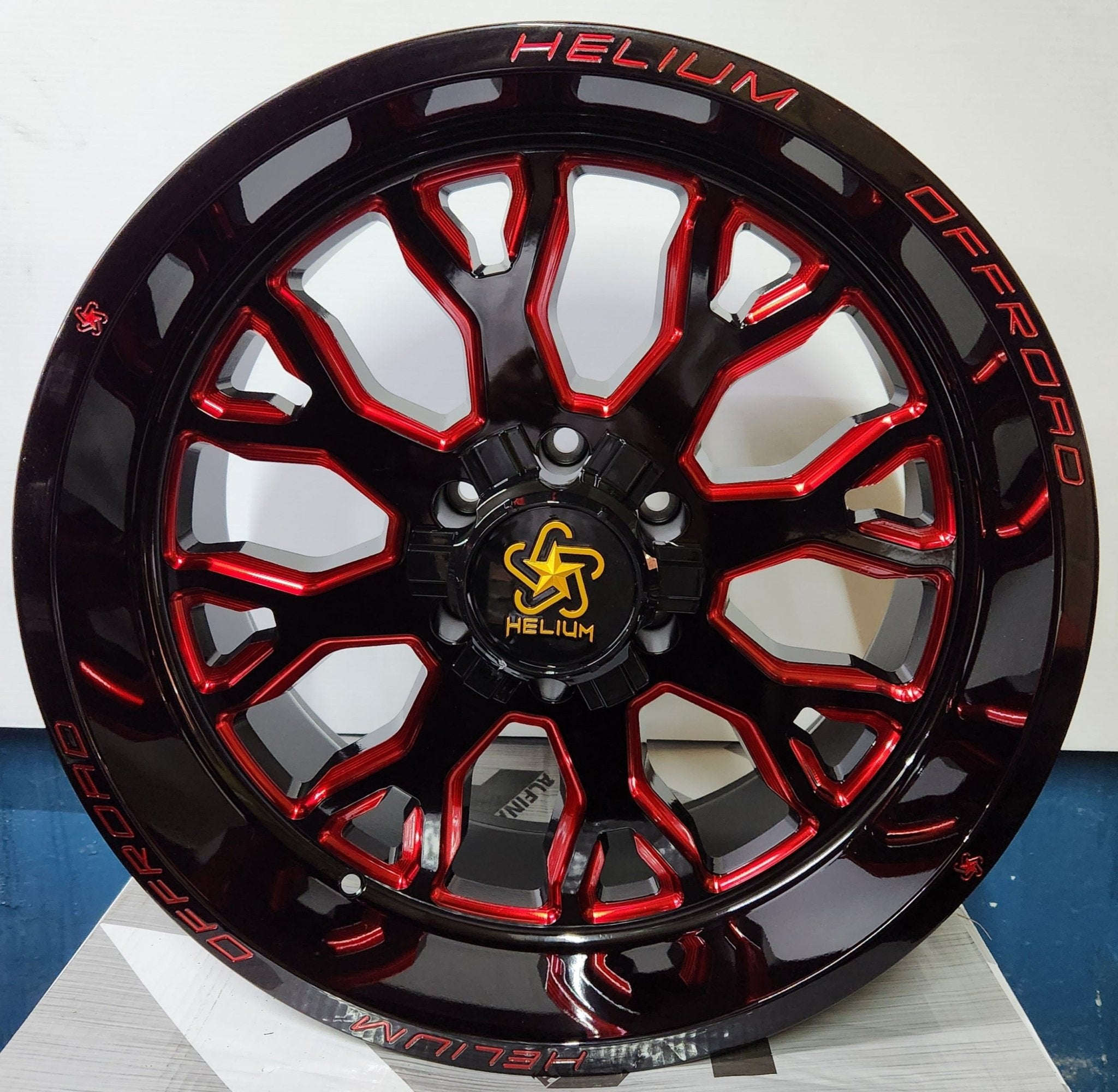 HELIUM HC-1-RM 20x10 6x135 / 6x139.7 PIANO BLACK W/CANDY RED MILLING