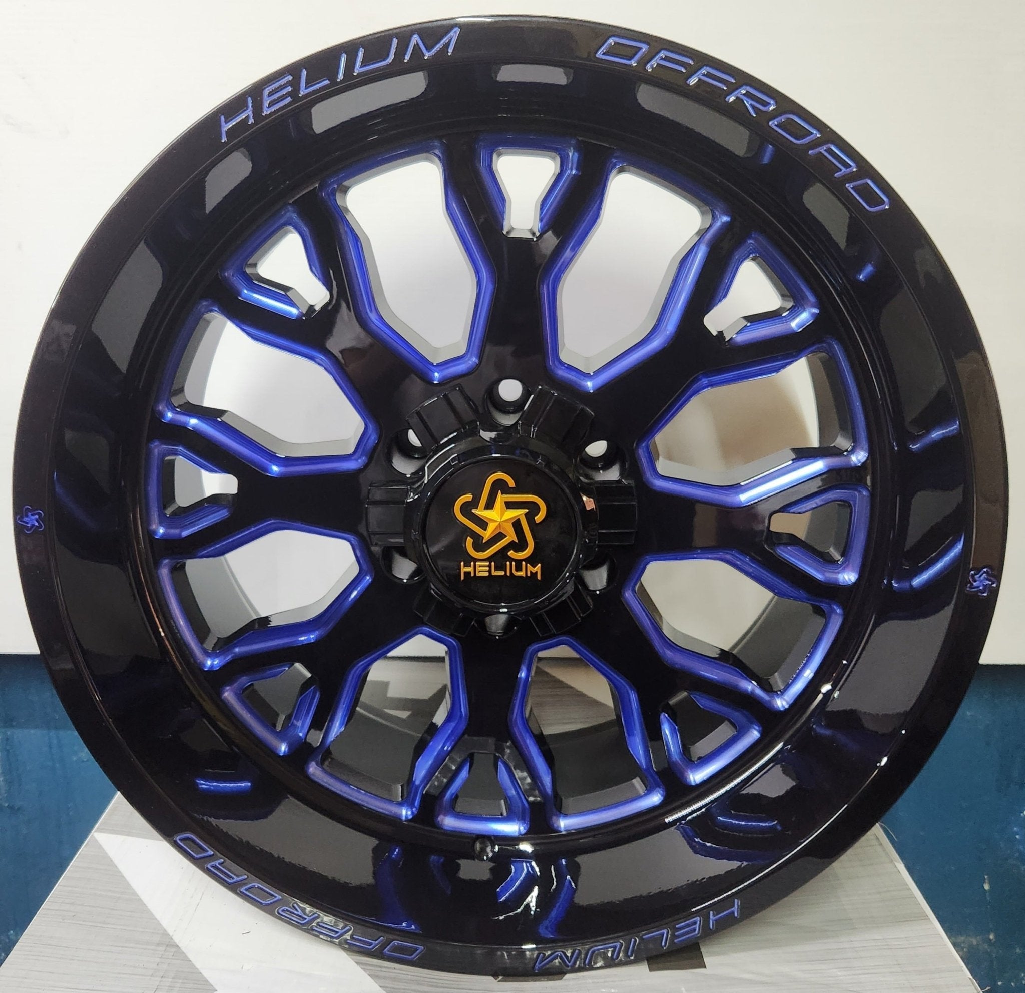 HELIUM HC-1-BM 20X10 6X135 6X139.7 PIANO BLACK W/BLUE MILLING