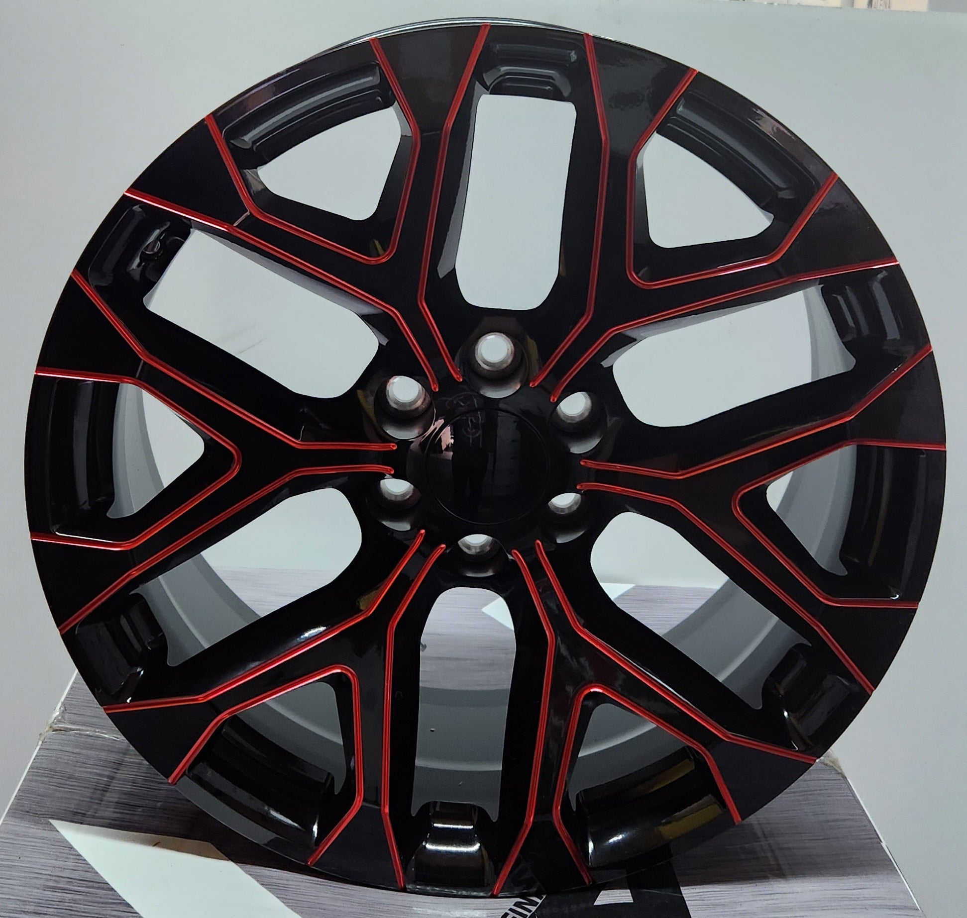 SW12 22X9.0 6X139.7 BLACK RED MILLED