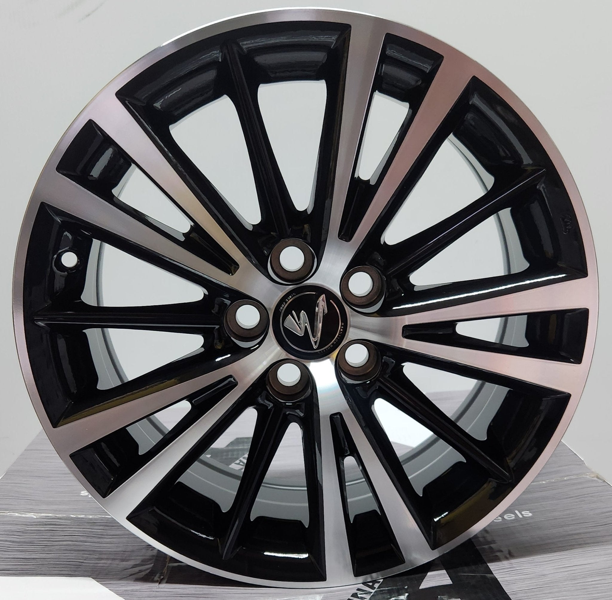 OE-0099 16x6.5 5x100 GLOSS BLACK MACHINE FACE