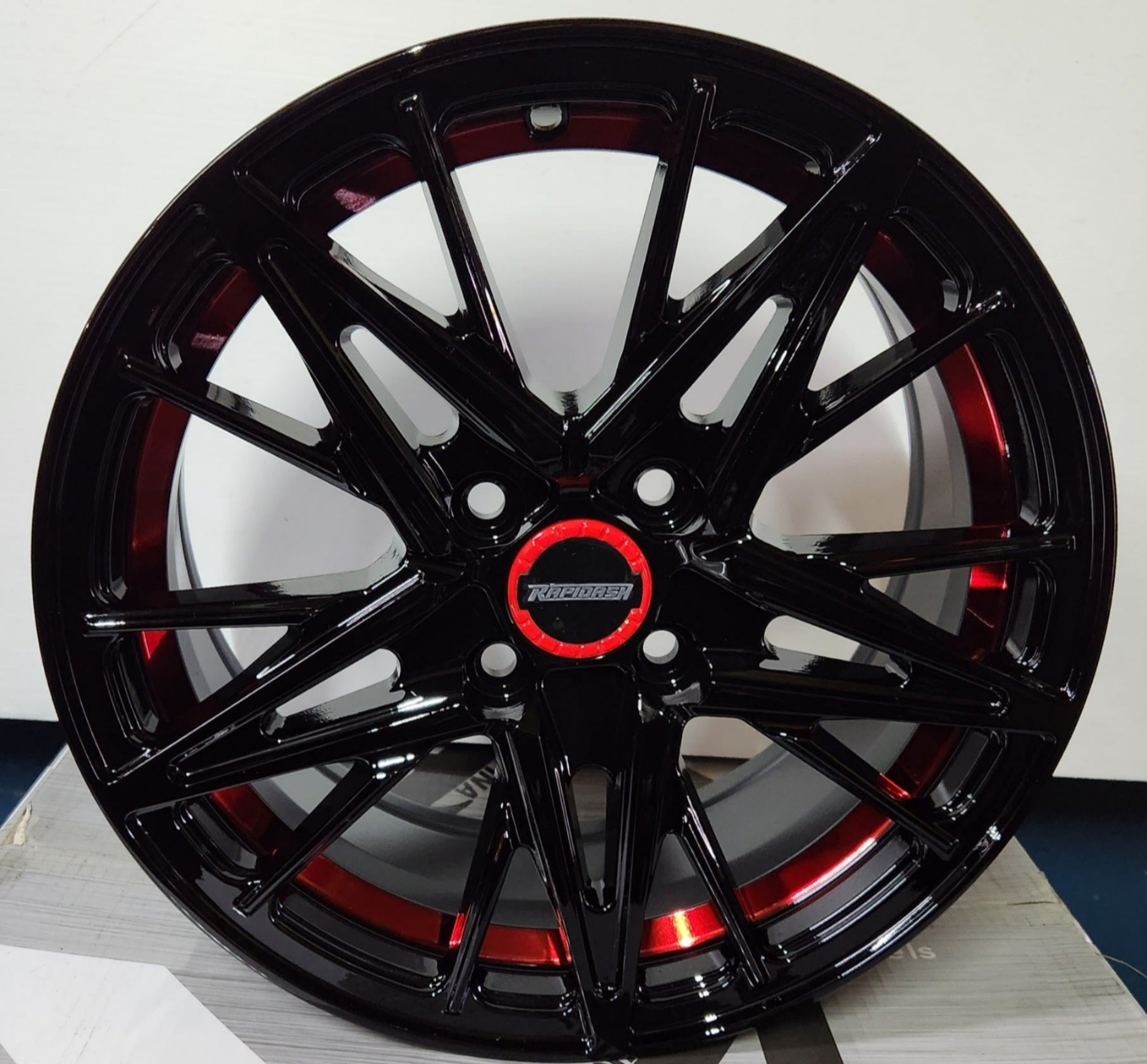 RAPIDASH RD- M105 15X6.5 4X100 PIANO BLACK RED UNDER CUT