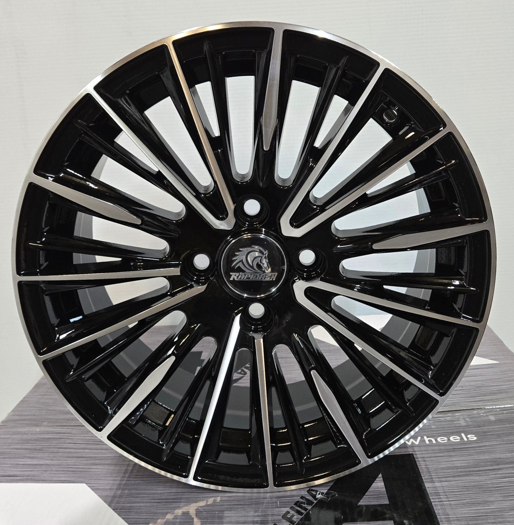 RAPIDASH RD-M8 15x6.5 4x100 GLOSS BLACK MACHINED FACE
