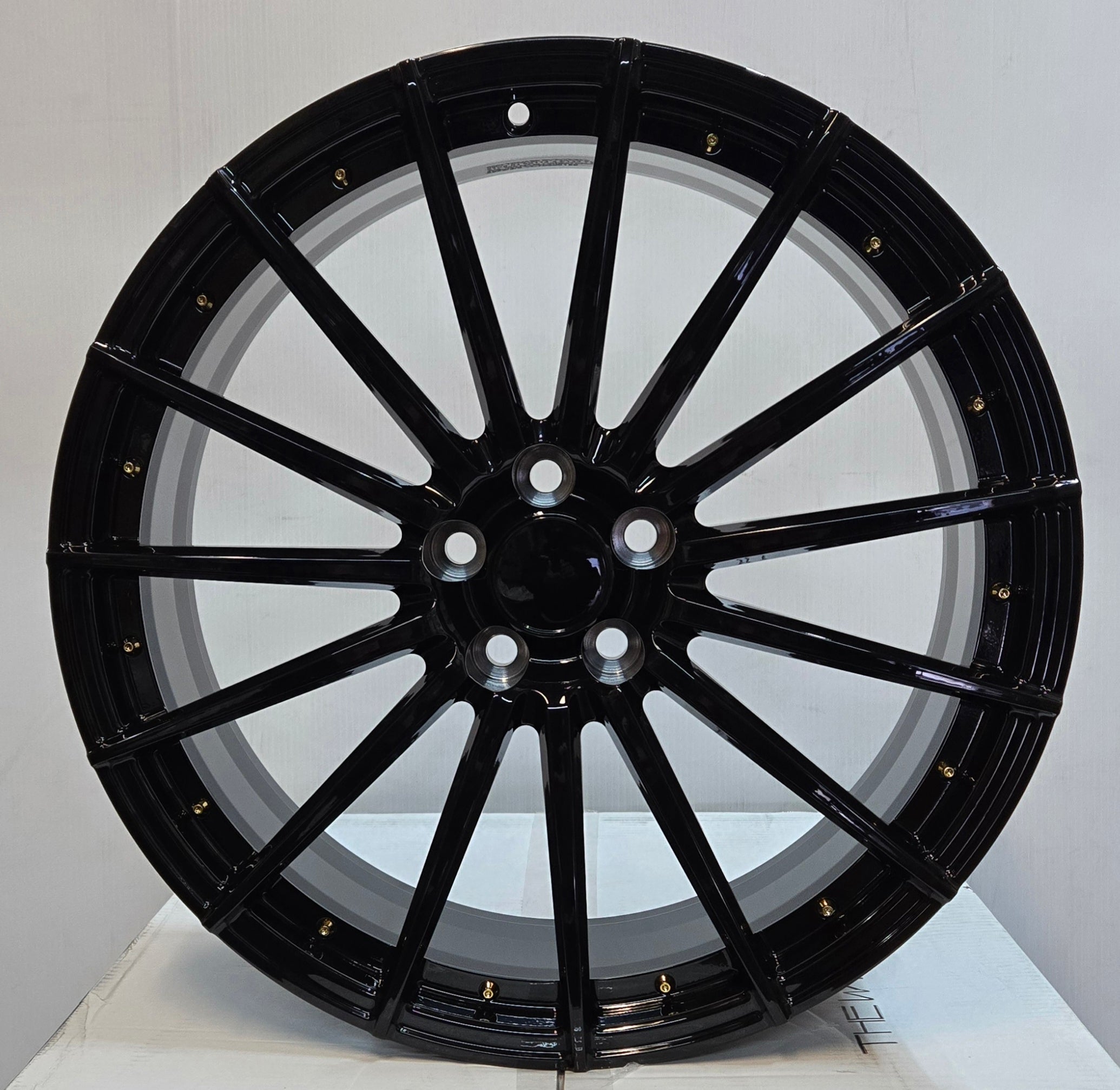 YC7969 21X8.0 5X114.3 GLOSS BLACK W GOLD RIVERT