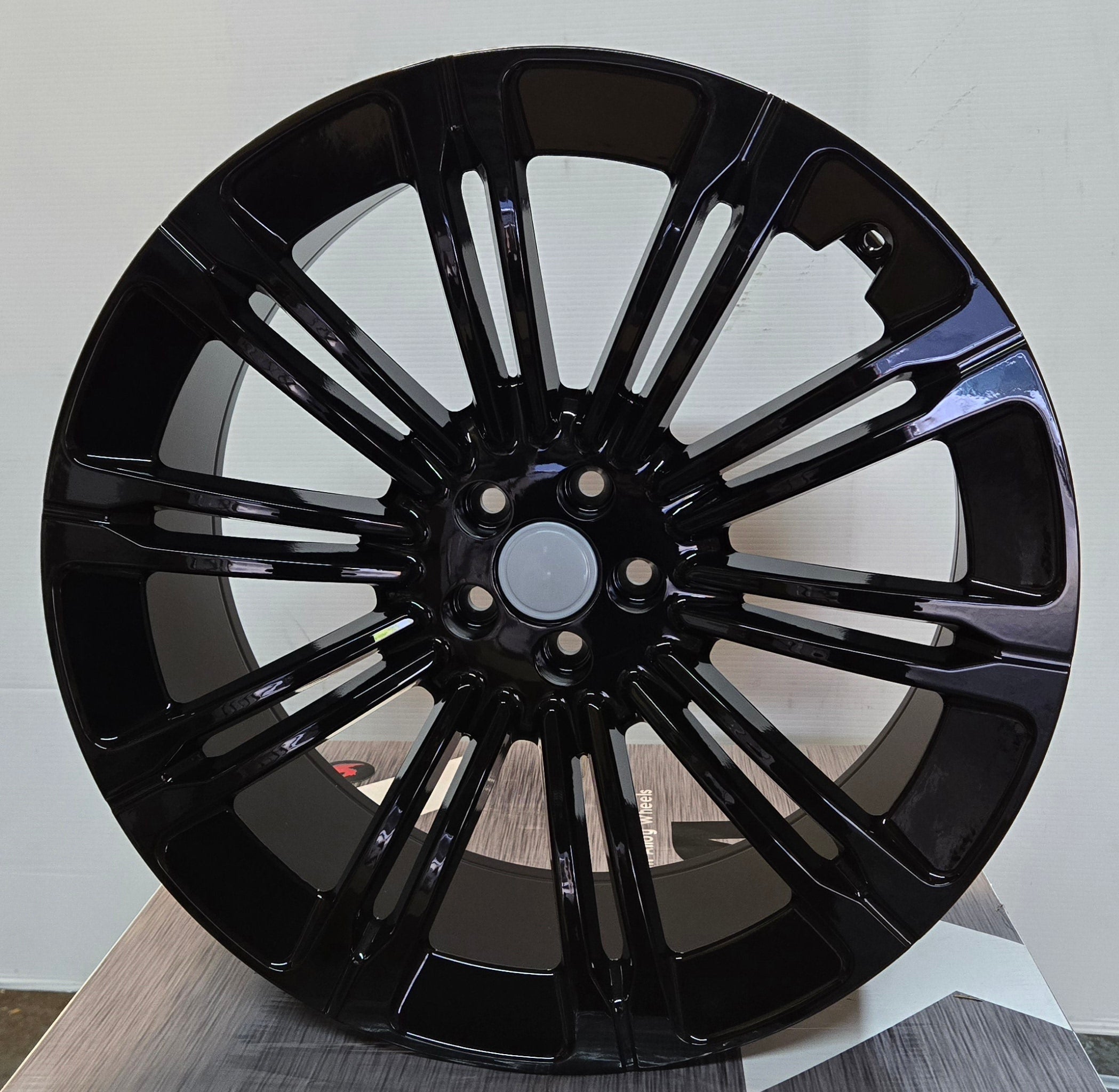 W792 22X9.5 5X108 GLOSS BLACK