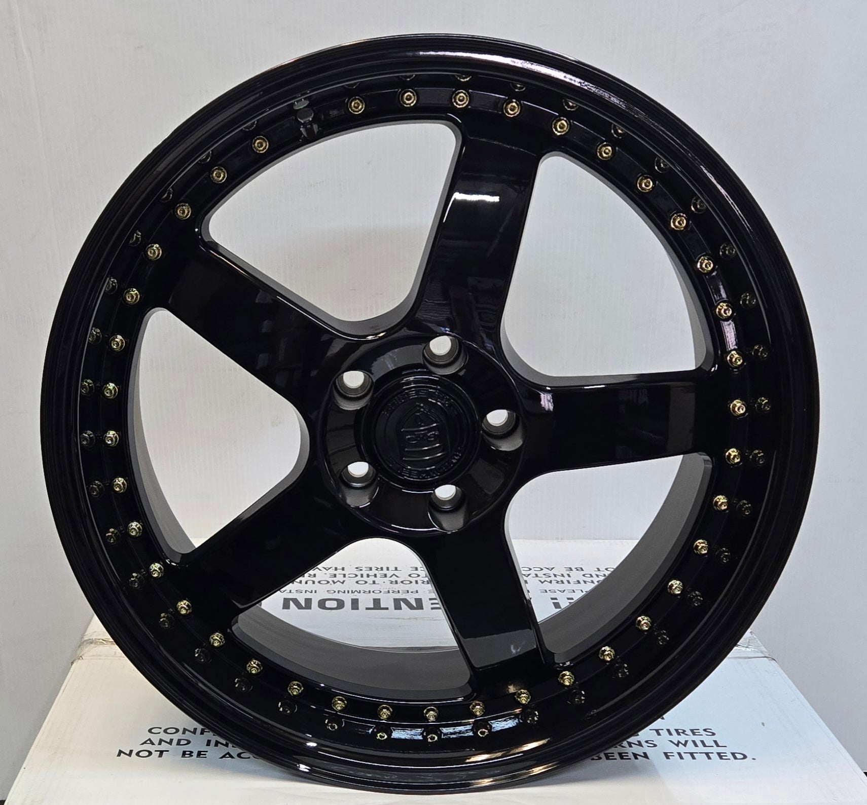 GWG NS8 19x8.5 GLOSS BLACK GOLD  RIVETS